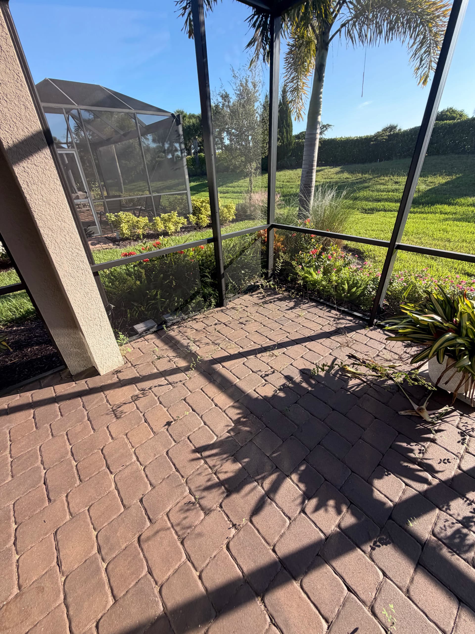 Gallery photos for Lanai Paver and Cage Cleaning Before and After: Image #1